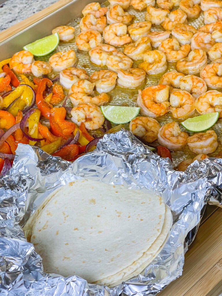 This one-pan wonder combines juicy shrimp, colorful bell peppers, and onions tossed in a smoky, zesty seasoning blend. Everything roasts to perfection on a single sheet pan, creating a meal that's ready in under 30 minutes. Serve them with warm tortillas, a dollop of sour cream, and your favorite toppings for a fiesta on your plate—without the mess or hassle. It’s a fresh, vibrant dinner idea that’s as simple as it is satisfying!