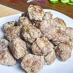 An easy and quick weeknight dinner, Greek Inspired Sheet Pan Meatballs are juicy meatballs bursting with familiar Greek flavors, baked on a sheet pan for fast clean, the perfect meal to make on a busy night. These Greek Meatballs are made with ground beef (or substitute lamb, chicken or turkey), garlic, red onion, and aromatic herbs like oregano, parsley, and mint. They’re tender, juicy, and packed with Mediterranean flair. Perfect for serving with tzatziki sauce, pita bread, or a fresh Greek salad, these meatballs are versatile enough for appetizers or a main meal. Shake up your usual dinner!