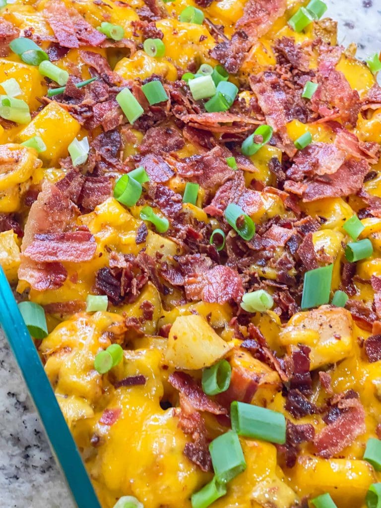 Chicken bacon ranch casserole is loaded with chicken breast, scallions, potatoes, cheddar cheese, and ranch seasoning and is made in one baking dish, making it the perfect weeknight family friendly dinner recipe.