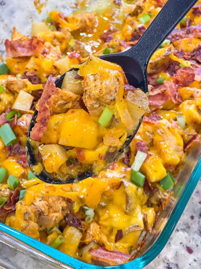 Chicken bacon ranch casserole is loaded with chicken breast, scallions, potatoes, cheddar cheese, and ranch seasoning and is made in one baking dish, making it the perfect weeknight family friendly dinner recipe.