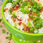 Loaded chip dip is an easy and quick dip recipe made with sour cream, cream cheese, crispy bacon, cheddar cheese, ranch seasoning and green onion that’s perfect for a party, tailgate, or any night of the week and is ready in less than 20 minutes.