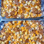 Cheez-it snack mix made with a combination of Parmesan and Cheddar Cheez-Its, oyster crackers, square pretzel snaps tossed in a buttery ranch and dill seasoning and baked to perfection. Perfect for a party!