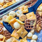 Cheez-it snack mix made with a combination of Parmesan and Cheddar Cheez-Its, oyster crackers, square pretzel snaps tossed in a buttery ranch and dill seasoning and baked to perfection. Perfect for a party!