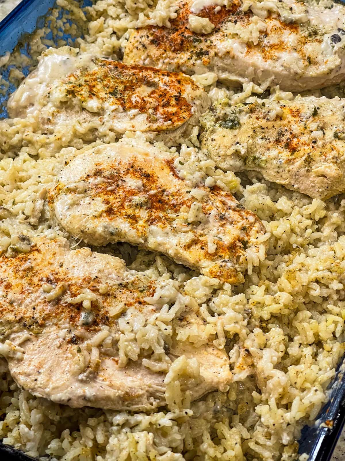 an easy, family friendly weeknight casserole of creamy rice and juicy chicken. This will be your new go-to dinner!