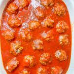 Porcupine meatballs are juicy and tender meatballs made with rice, ground beef, and seasonings in a tangy tomato sauce, all baked in one dish in the oven. These scrumptious meatballs are easy, kid friendly and a perfect weeknight dinner served alongside mashed potatoes and your favorite vegetables. #easydinner #meatballs #kidfriendy #Stephgigliotti #onedishmeal