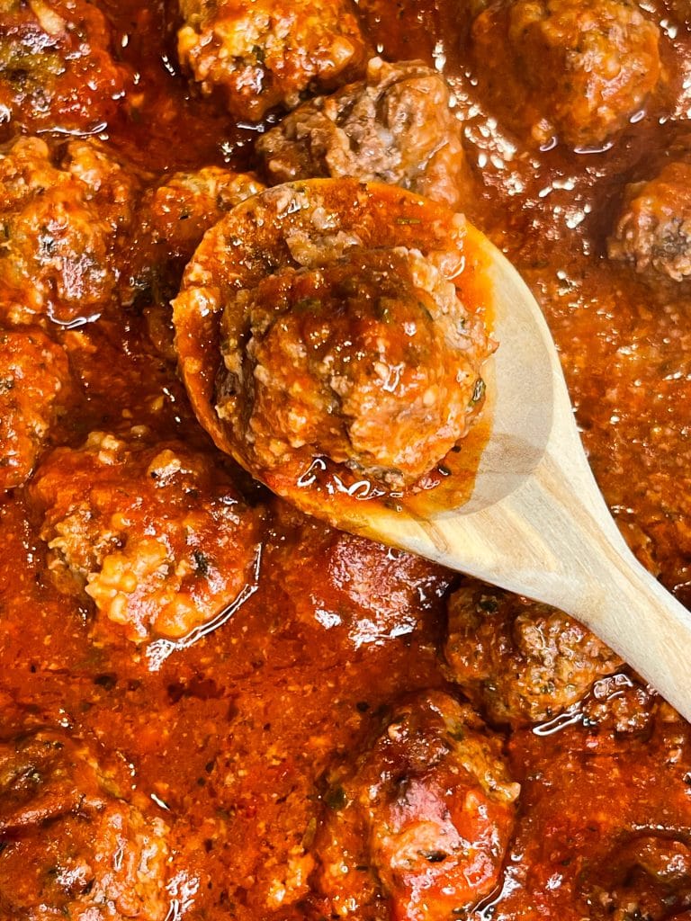 Porcupine meatballs are juicy and tender meatballs made with rice, ground beef, and seasonings in a tangy tomato sauce, all baked in one dish in the oven. These scrumptious meatballs are easy, kid friendly and a perfect weeknight dinner served alongside mashed potatoes and your favorite vegetables. #easydinner #meatballs #kidfriendy #Stephgigliotti #onedishmeal