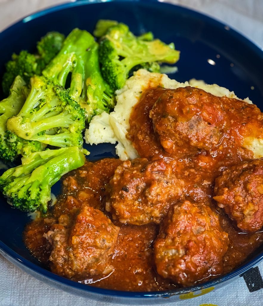 Porcupine meatballs are juicy and tender meatballs made with rice, ground beef, and seasonings in a tangy tomato sauce, all baked in one dish in the oven. These scrumptious meatballs are easy, kid friendly and a perfect weeknight dinner served alongside mashed potatoes and your favorite vegetables. #easydinner #meatballs #kidfriendy #Stephgigliotti #onedishmeal