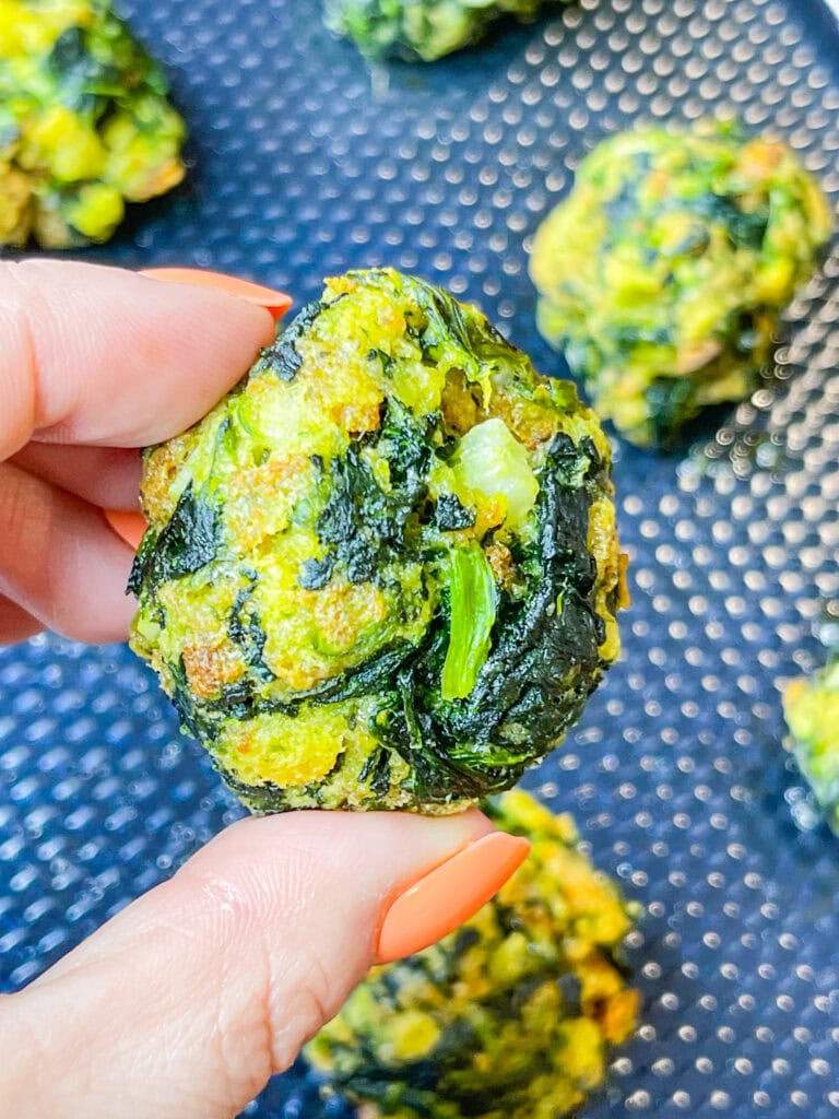 Spinach Balls are a simple, make ahead appetizer! They are delicious warm or room temperature. Spinach Balls can be frozen and pulled out anytime for effortless entertaining. 