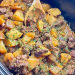 This delicious weeknight meal is made with beef and potatoes in an onion and butter sauce slow cooked until the beef is juicy and the potatoes are tender. A perfect family meal any day of the week.