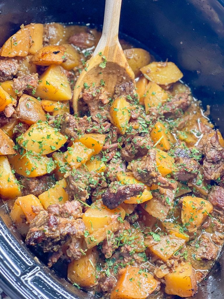 This delicious weeknight meal is made with beef and potatoes in an onion and butter sauce slow cooked until the beef is juicy and the potatoes are tender. A perfect family meal any day of the week.