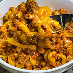 Old Fashioned American Goulash is an easy 30 minute meal, cooked in one pot with macaroni, tomato sauce, and ground beef. It's hearty and delicious and a quick weeknight dinner.