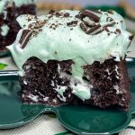 Andes Mint Poke Cake is a fudgy chocolate cake topped with a minty whipped cream and Andes mint candies. This easy poke cake is perfect for St Patrick's Day or for anyone who loves mint!