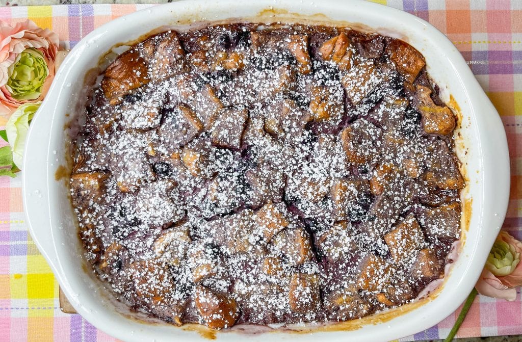 This Overnight Blueberry French Toast Casserole is perfect for any holiday morning, brunch or a lazy weekend. Throw everything in to a casserole dish the night before and let all the yumminess soak in to the brioche bread before popping it into the oven for the easiest breakfast ever!