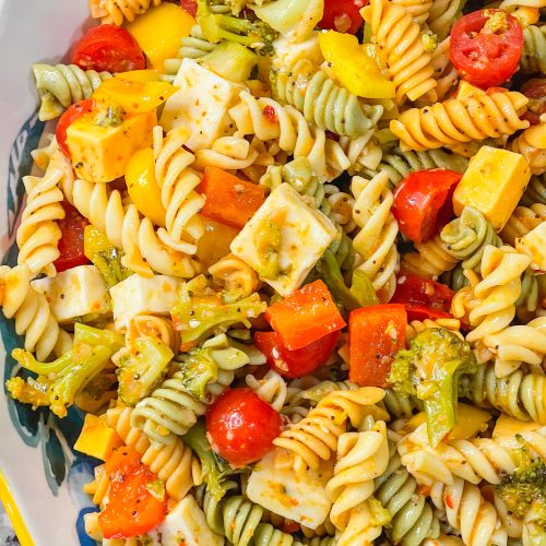 This pasta salad is a combination of rotini pasta, chunky cheeses, veggies zesty Italian dressing and seasoning is just amazing! Great for any get-together or summer picnic.