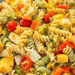 This pasta salad is a combination of rotini pasta, chunky cheeses, veggies zesty Italian dressing and seasoning is just amazing! Great for any get-together or summer picnic.