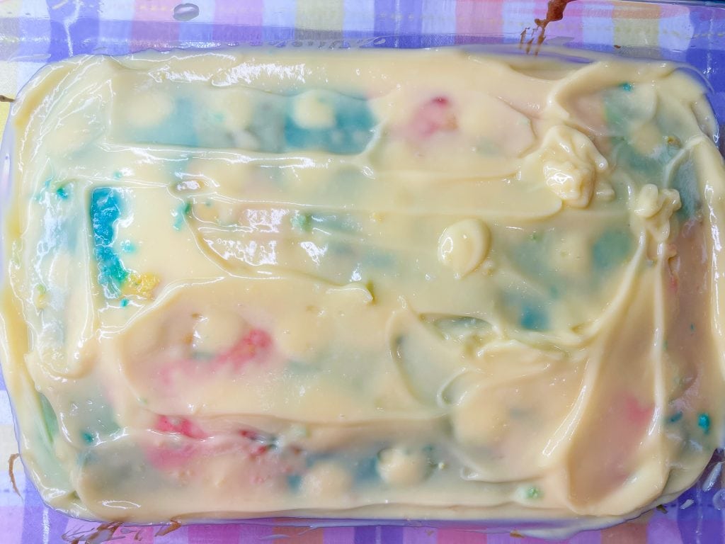 This colorful Easter Poke Cake is sure to delight on your Easter table! This cake is so easy to prepare but looks like an absolute show stopper. All you need is a box of cake mix, food coloring, pudding mix and cool whip for the brightest dessert to WOW your guests.