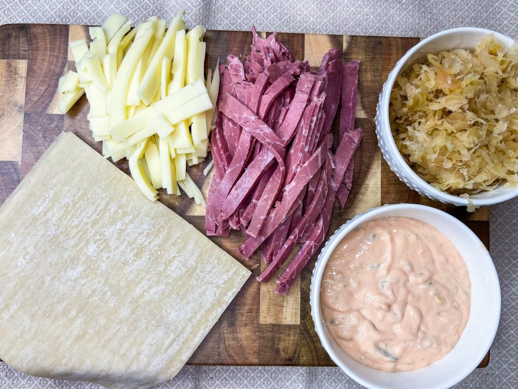 The classic sandwich, rolled up in a crispy and delicious shell. You'll love these Air Fryer Rueben Egg Rolls!