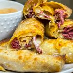 The classic sandwich, rolled up in a crispy and delicious shell. You'll love these Air Fryer Rueben Egg Rolls!