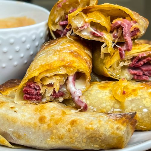 The classic sandwich, rolled up in a crispy and delicious shell. You'll love these Air Fryer Rueben Egg Rolls!