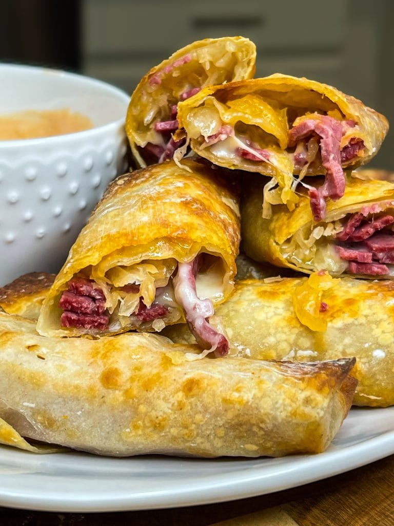 The classic sandwich, rolled up in a crispy and delicious shell. You'll love these Air Fryer Rueben Egg Rolls!