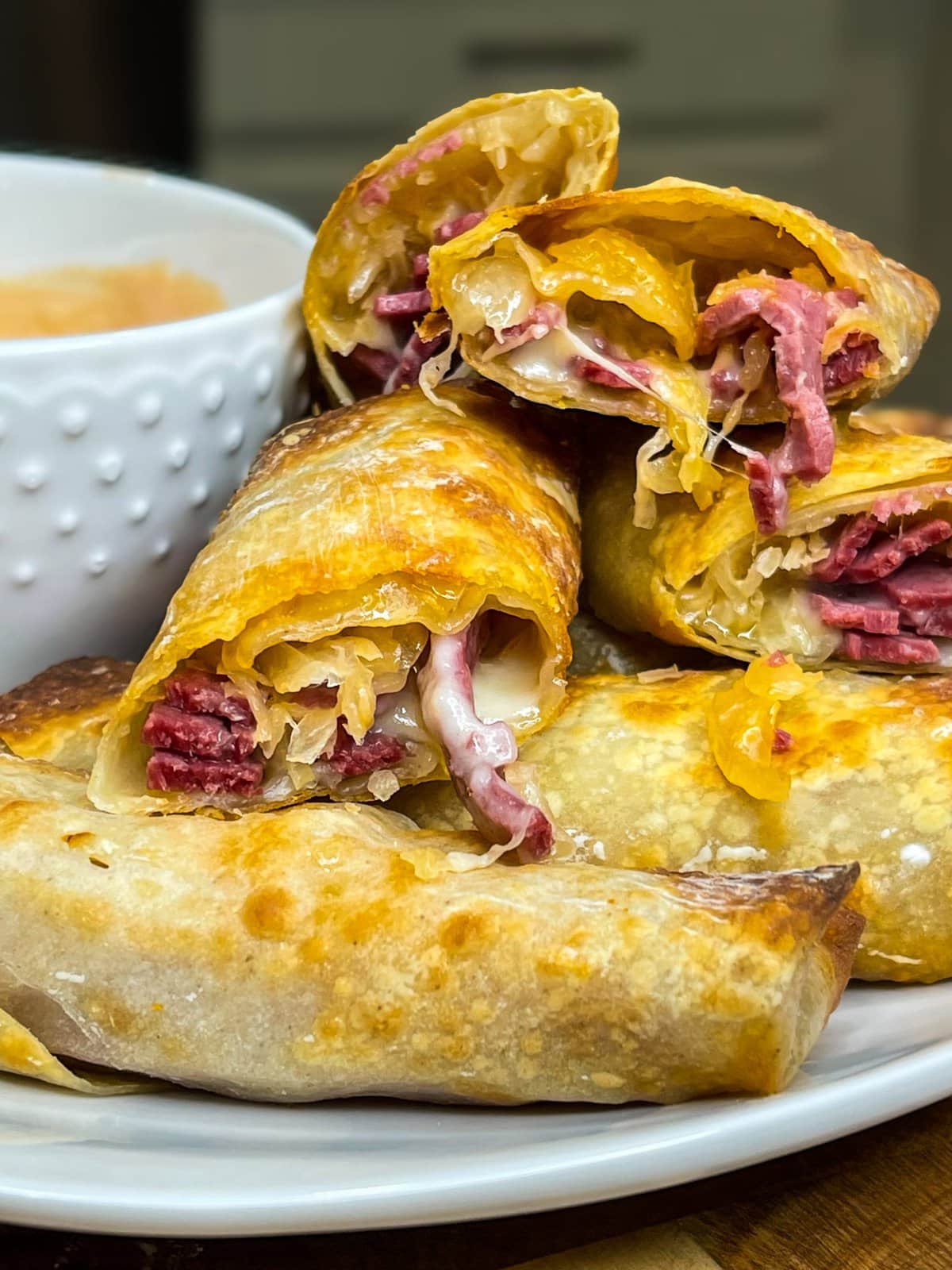 The classic sandwich, rolled up in a crispy and delicious shell. You'll love these Air Fryer Rueben Egg Rolls!