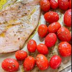 Love sheet pan dinners? This is for you! Sheet Pan Italian Style Chicken is super easy and super flavorful. Sweet roasted tomatoes top juicy, cheesy chicken and it's finished off with fresh herbs and a drizzle of balsamic vinegar. The perfect week night meal.