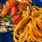 Love sheet pan dinners? This is for you! Sheet Pan Italian Style Chicken is super easy and super flavorful. Sweet roasted tomatoes top juicy, cheesy chicken and it's finished off with fresh herbs and a drizzle of balsamic vinegar. The perfect week night meal.