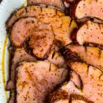 Easy and delicious, this slow cooker glazed ham is just 5 simple ingredients for a juicy ham dinner.