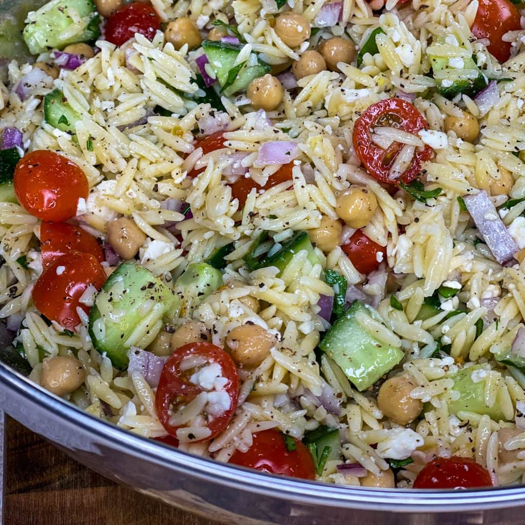 This Orzo Salad is light and refreshing, but healthy and still delicious. It's full of protein from the chickpeas and feta cheese, crunch from cucumbers, has healthy fat and is super flavorful from the dressing. 