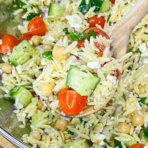 This Orzo Salad is light and refreshing, but healthy and still delicious. It's full of protein from the chickpeas and feta cheese, crunch from cucumbers, has healthy fat and is super flavorful from the dressing.