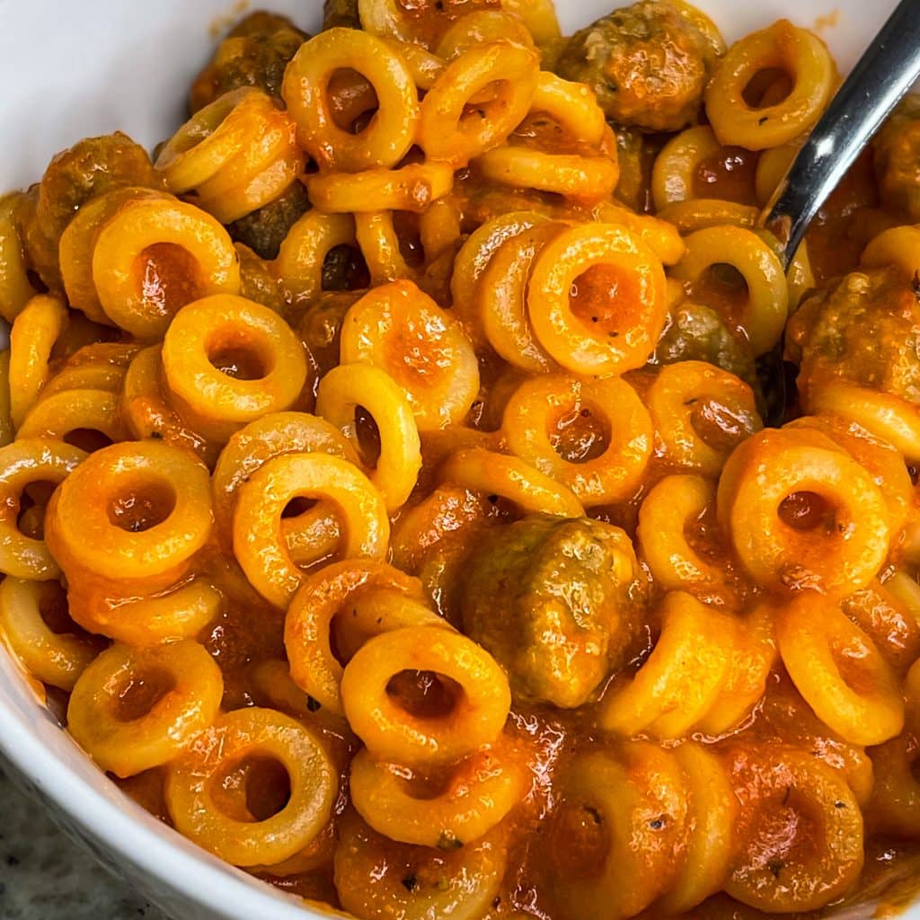 Homemade Spaghetti-o's are warm and comforting and full of nostalgia. Spaghetti-o's have those iconic pasta rings floating around in a creamy tomato sauce topped off with mini meatballs. I promise this homemade version tastes so much better than you remember.