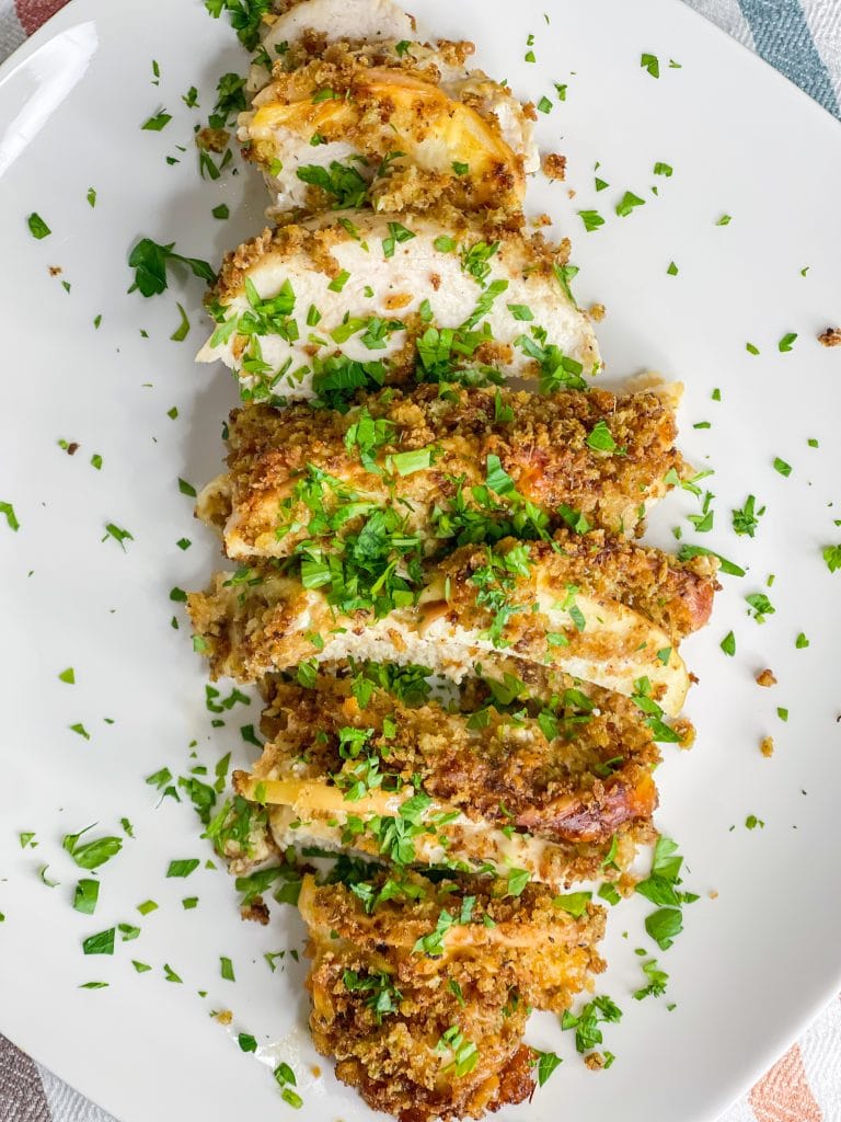 Hasselback chicken is so easy to make, but it looks so fancy! It's chicken breast cut hasselback style, then stuffed with the perfect pairing of gouda cheese and sliced gala apples. But it doesn't stop there! The chicken is topped with a panko breadcrumb mixture and when baked gives the chicken a nice crunch in every bite.