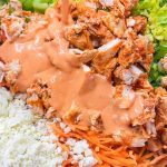 Buffalo Chicken Pasta Salad is spicy and cool with a creamy buffalo ranch sauce mixed with crunchy carrots and celery with a bite of blue cheese. Perfect for any summer occasion.