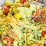 This quick and easy Creamy Shrimp Pasta Salad, with shrimp, veggies, pasta, and an avocado dressing, is the perfect pairing for any occasion.