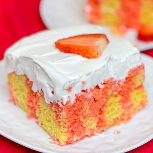 This Strawberry Shortcake Poke Cake is so delicious, you won't believe it's just 3 main ingredients! The perfect cake of the summer.