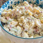 Classic Macaroni Salad is the ultimate side dish of the summer and is invited to all the BBQ's! It's creamy, crunchy, and so simple to prepare.