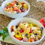 Love Italian subs? You will absolutely LOVE this Italian Sub Pasta Salad made with Italian meats, mozzarella cheese, tortellini, and veggies in an Italian vinaigrette. This pasta salad will make you the star of any get-together.