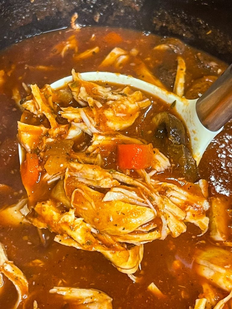 Juicy chicken smothered in a flavorful mushroom tomato sauce, Slow Cooker Chicken Cacciatore is a comfort dish that's easy enough for a weeknight dinner.