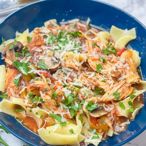 Juicy chicken smothered in a flavorful mushroom tomato sauce, Slow Cooker Chicken Cacciatore is a comfort dish that's easy enough for a weeknight dinner.