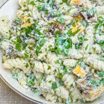 Creamy Bacon Ranch Pasta Salad combines crisp bacon, cheddar cheese, tender pasta with peas for a juicy bite with a creamy ranch dressing. A great summer pasta salad for any occasion.