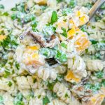 Creamy Bacon Ranch Pasta Salad combines crisp bacon, cheddar cheese, tender pasta with peas for a juicy bite with a creamy ranch dressing. A great summer pasta salad for any occasion.