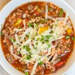 This Slow Cooker Stuffed Pepper Soup is a deconstructed stuffed pepper, hearty yet light, and easy to prepare with simple pantry ingredients, perfect for a comforting dinner or make ahead lunch.