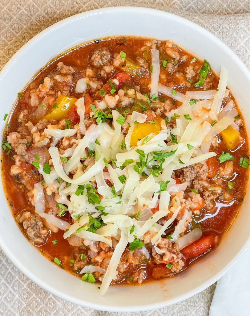 This Slow Cooker Stuffed Pepper Soup is a deconstructed stuffed pepper, hearty yet light, and easy to prepare with simple pantry ingredients, perfect for a comforting dinner or make ahead lunch.