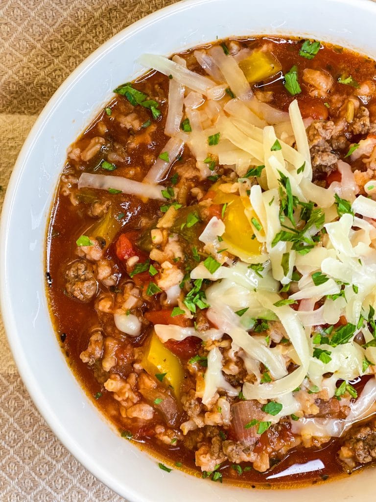 This Slow Cooker Stuffed Pepper Soup is a deconstructed stuffed pepper, hearty yet light, and easy to prepare with simple pantry ingredients, perfect for a comforting dinner or make ahead lunch.