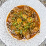 Crock Pot Salisbury Meatballs are juicy meatballs smothered in a flavorful brown gravy served over a big pile of fluffy mashed potatoes. The best thing about this recipe is that you can use homemade or frozen meatballs.