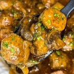 Crock Pot Salisbury Meatballs are juicy meatballs smothered in a flavorful brown gravy served over a big pile of fluffy mashed potatoes. The best thing about this recipe is that you can use homemade or frozen meatballs.