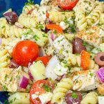 If you love the flavors of the Mediterranean, you'll love this Greek Pasta Salad with tender pasta, kalamata olives, red peppers, cucumbers, juicy tomatoes, tangy red onion, and creamy feta cheese all tossed in an herby olive oil dressing.