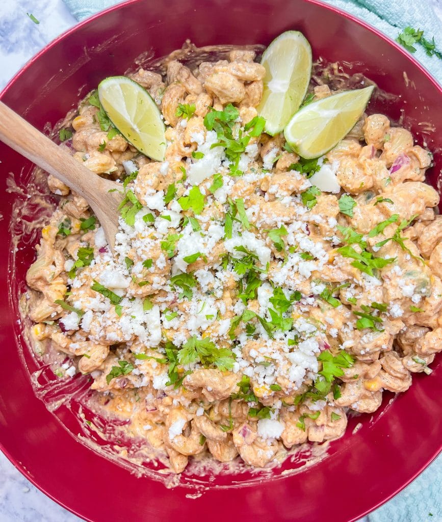 Street Corn Pasta Salad has all the ingredients of traditional Mexican street corn, but uses canned fire roasted corn, for a short cut, and has pasta.