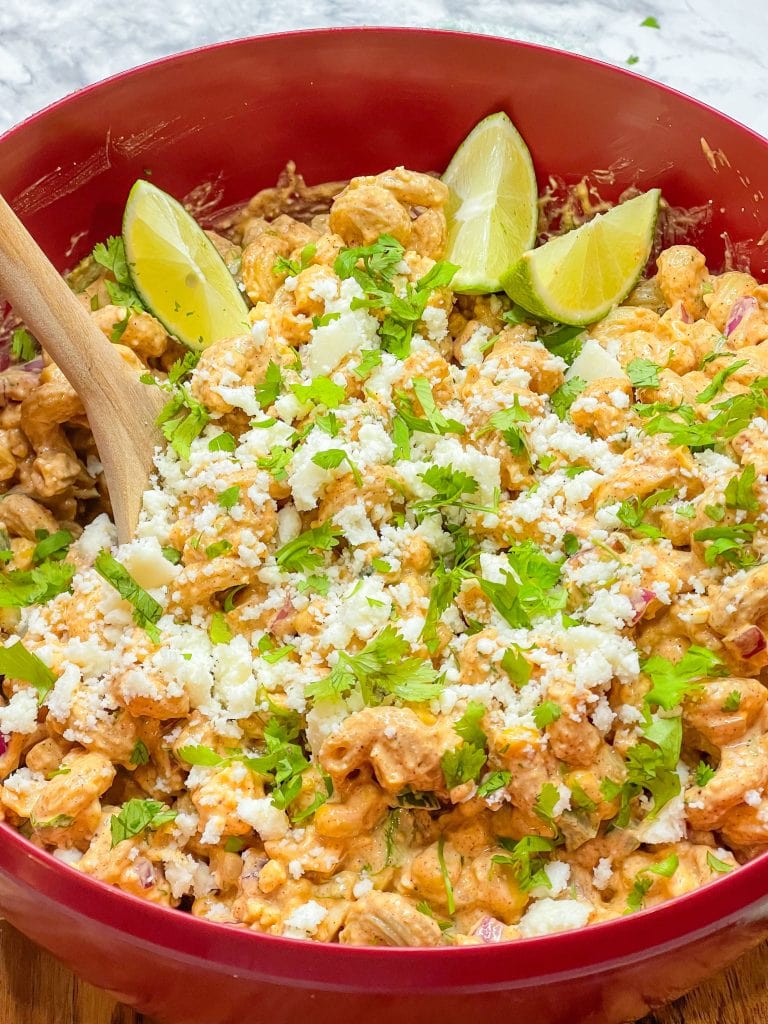 Street Corn Pasta Salad has all the ingredients of traditional Mexican street corn, but uses canned fire roasted corn, for a short cut, and has pasta.