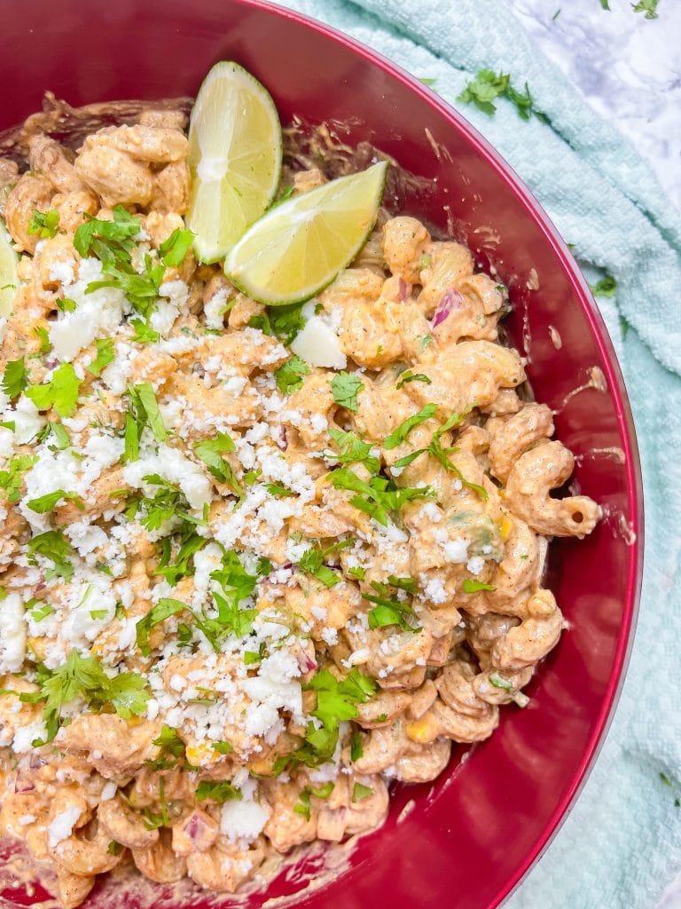 Street Corn Pasta Salad has all the ingredients of traditional Mexican street corn, but uses canned fire roasted corn, for a short cut, and has pasta.